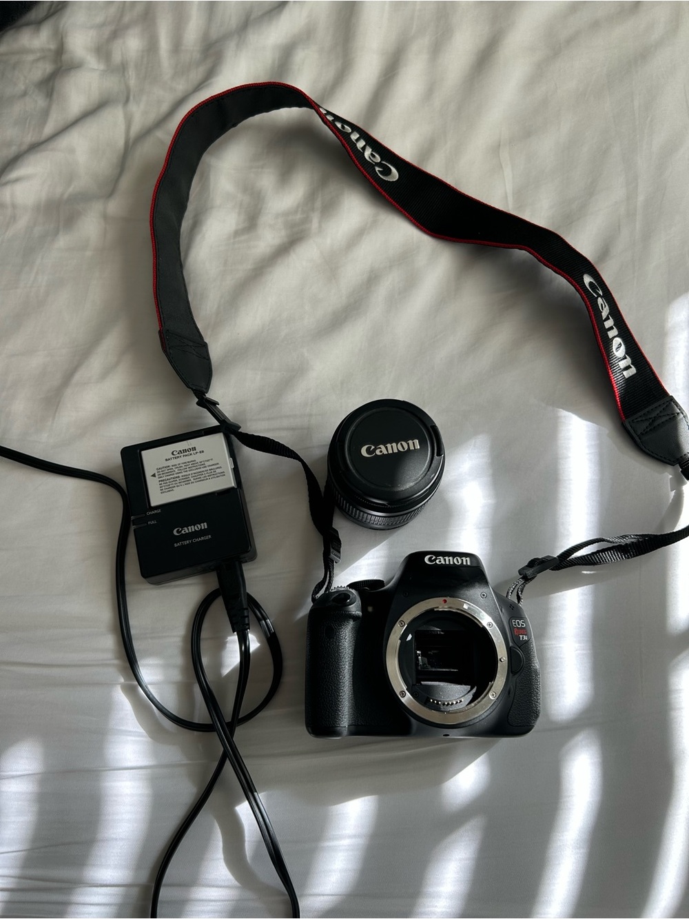 Canon T3I + 18-55mm Lens + Strap + Charger Bundle